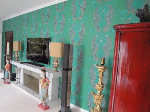 gloeoeckler tapeten gruen cheminee